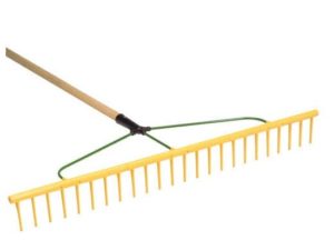 Yellow landscaping rake with a long wooden handle and wide tines.