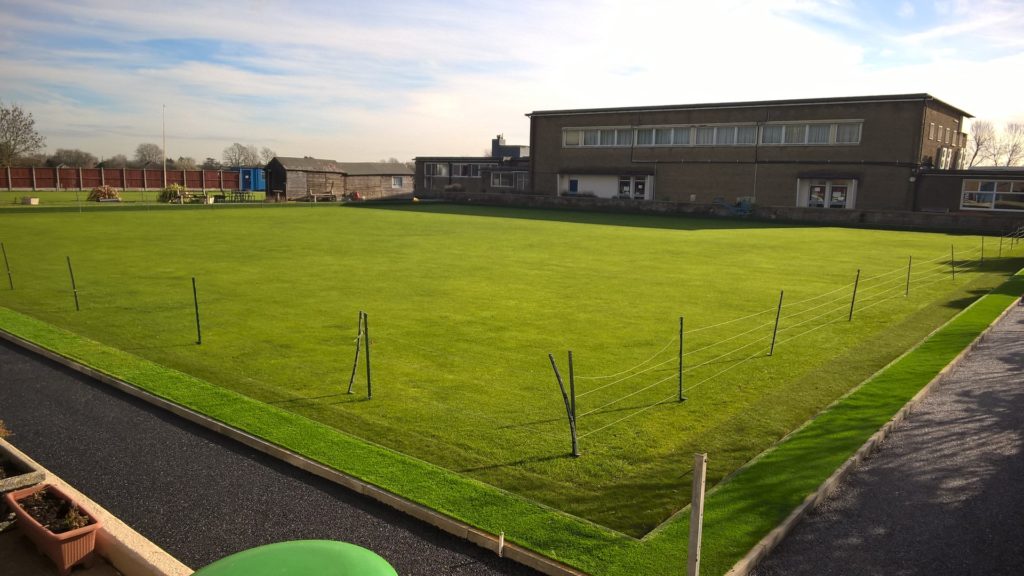 WP_20160211_11_04_36_Pro A fenced sports club pitch with main building in the background