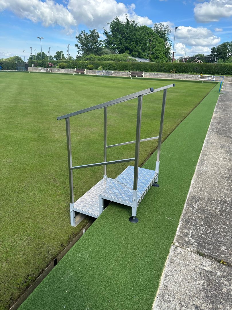 BW30 New 2024 Side access steps in place on a bowling green